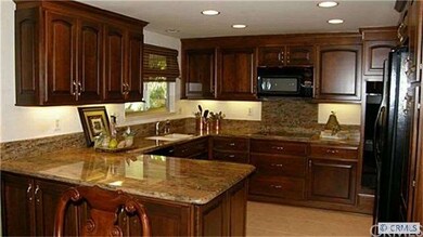 Gourmet Kitchen-note the rich cherrywood cabinetry