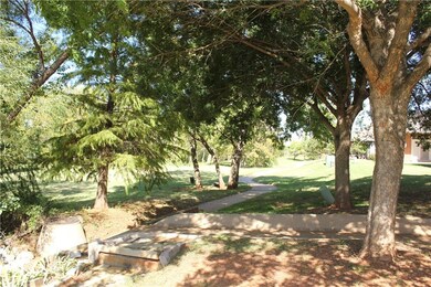 View of green belt and walking trail.