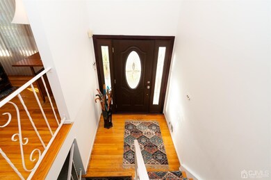 The beautiful front door allows entry to this four