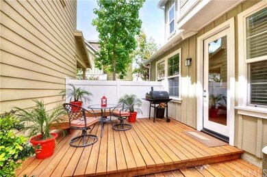 Custom built deck in the bright and sunny backyard