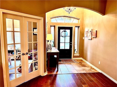 Entrance foyer area. The office/flex room is throu
