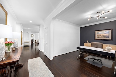 Beautiful entry opens into the front room, current