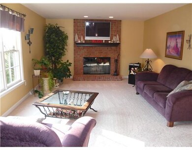 Family Room. Brick hearth fireplace has gas logs. Face/Mantel is wired for tv mounting.