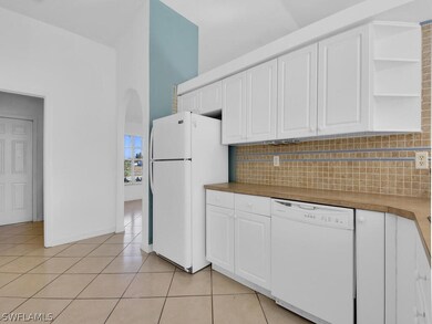 Tile Backsplash & Lots Of Cabinet Space