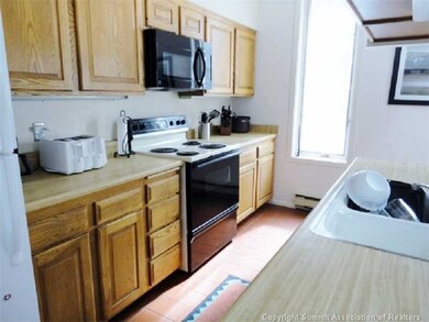 Kitchen. Tile Flooring and window in the kitchen