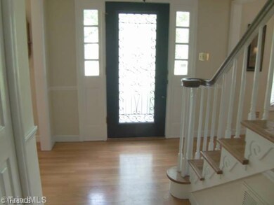 Exterior Front. Lovely front door and see the beautiful real hardwood floors!