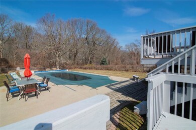 Two tiered deck to patio and salt water pool
