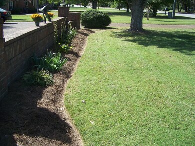 FRESHLY LANDSCAPED AND MULCHED!
