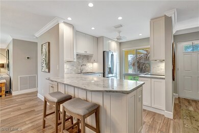 300 Palm Dr unit 402, Naples, FL 34112 - photo 2