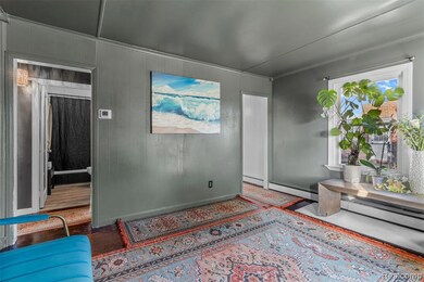 Sitting room with wooden walls