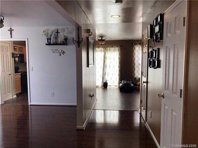 Taken from foyer showing formals on left and famil