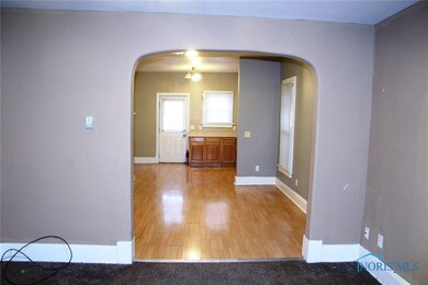 Living room to dining room to kitchen