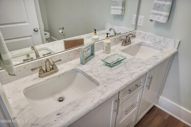 Primary Bathroom with dual vanities