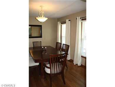Dining Room - Hardwood floors continue into dining