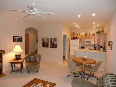 Living area with Kitchen in background