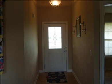 Foyer as you great your guests.  New Front Door added natural light.