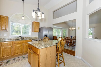 Granite counter-tops and the center island has a b