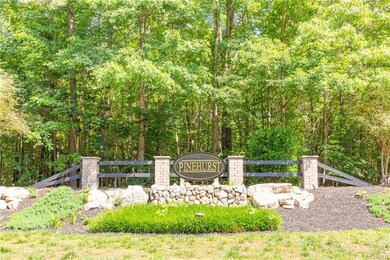 Landscaped entrance into the Pinehurst neighborhood.
