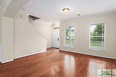 View of front entry and formal living room from th