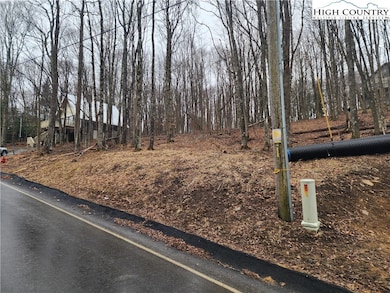 Lot Corner near the telephone - culvert is for the