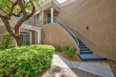 View of exterior entry featuring stucco siding and