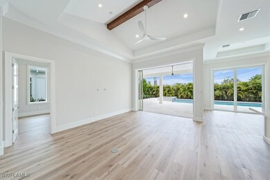 The open concept great room, kitchen, and dining a