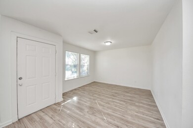 Lots of natural light fills this room, which can easily be designated as a formal dining area.