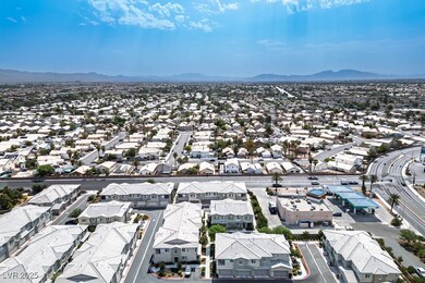 Aerial view of residential area featuring a mounta