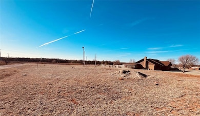 View of yard with a rural view
