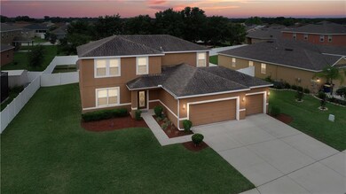 The Dusk Aerial View of Home