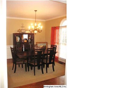 Crown molding and large formal dining room