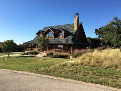 Lot for sale is to the right of this existing home