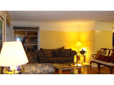 Living Room. Spacious living room has hardwood flo