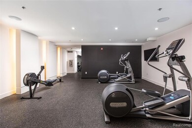 Exercise room featuring recessed lighting
