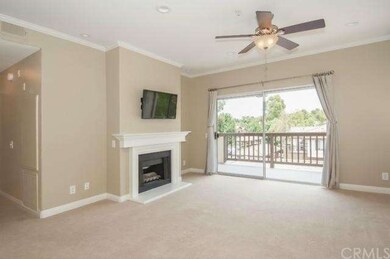 Spacious family room, with balcony and fireplace -