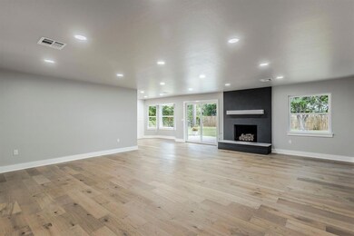 Unfurnished living room with light hardwood / wood