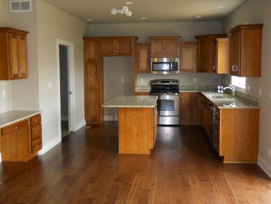 Large kitchen with center island/desk