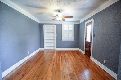 Front room/living room.  Gorgeous plantation shutt