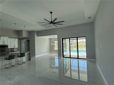 Kitchen with appliances with stainless steel finis