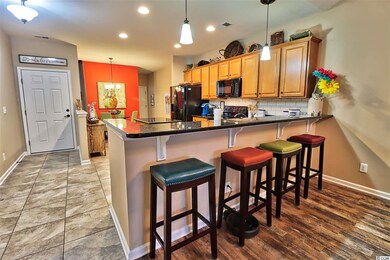 Foyer area opens to the Kithen and Dining Room.