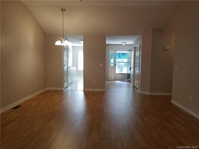 dining area, kitchen and foyer