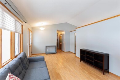 Another view of the living room leading to the hal