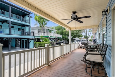 Wooden porch with ceiling fan