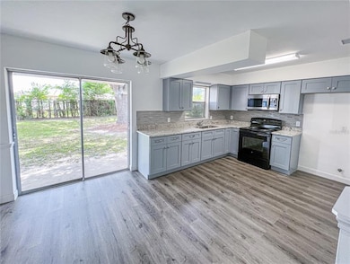 8639 Fish Lake Rd, Tampa, FL 33619 - photo 4