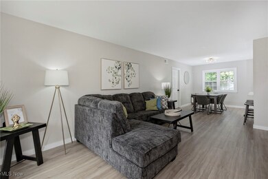 Living area featuring light wood-style floors