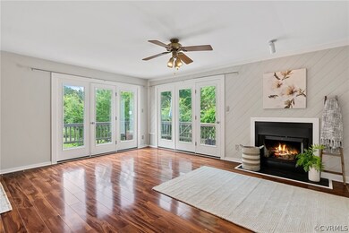 Open Living Space with windows over looking the la