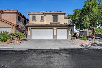 View of front of property with a garage, a tile ro