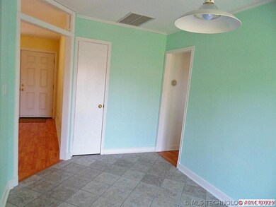 The dining room also has tiled flooring.