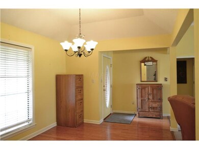 ENTER THE HOME AND THE OPEN FLOOR PLAN HAS THE DIN
