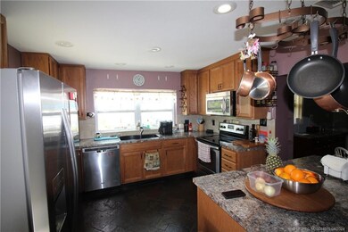 The well designed kitchen features stainless steel